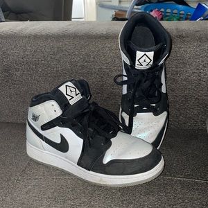 Youth Nike Air Jordan 1. Black and white. Like new. Worn as good not play shoes.